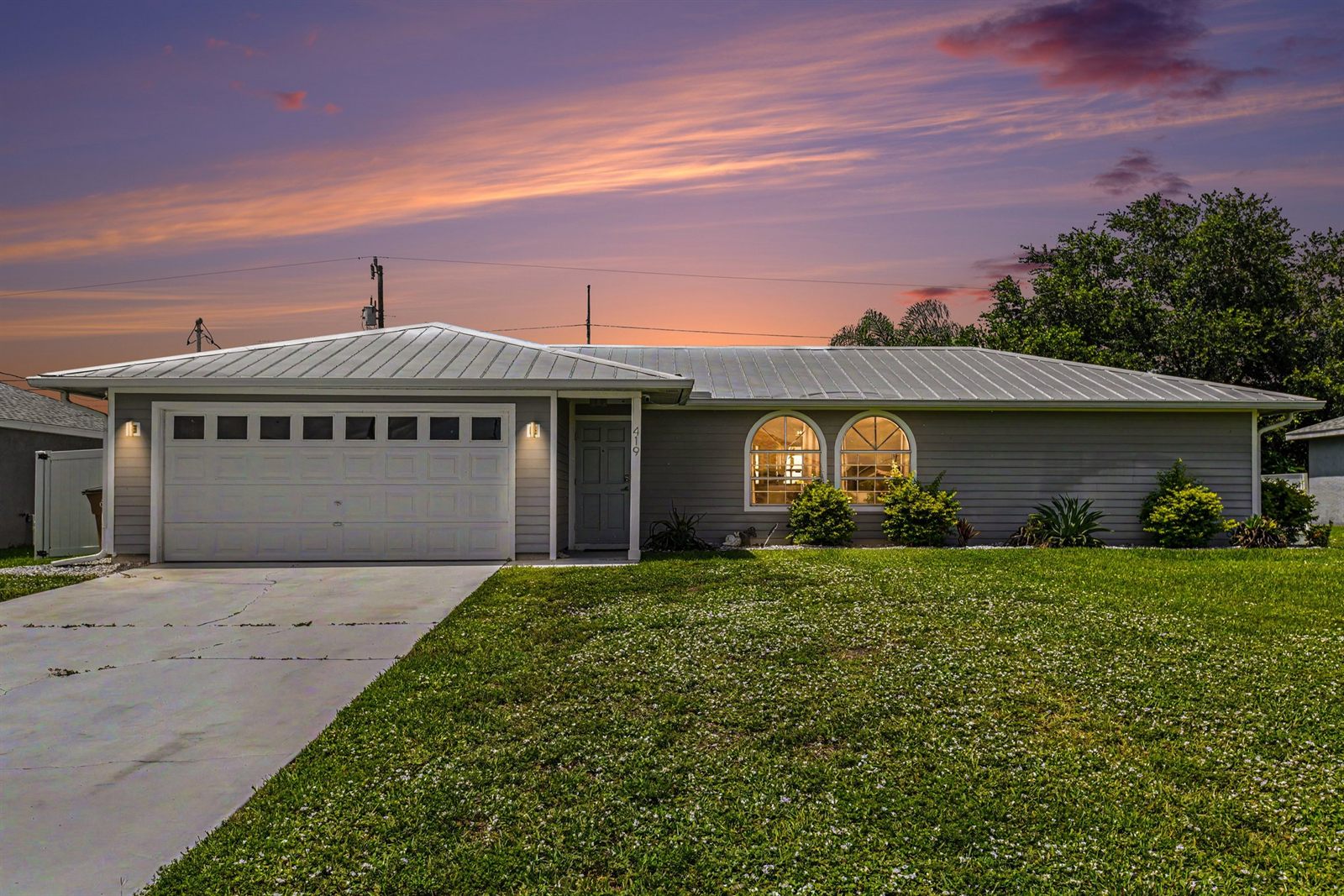 Cape Escape vacation home exterior at dusk